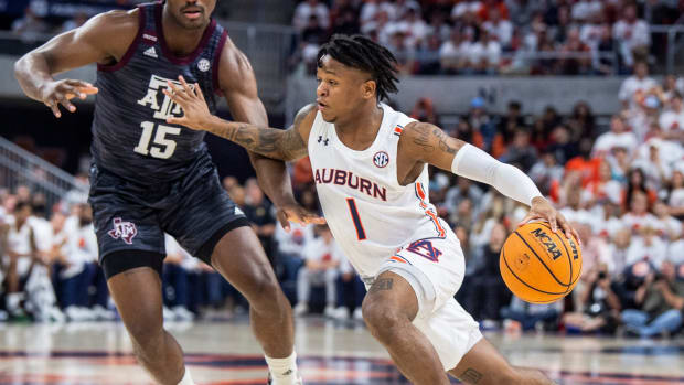 Auburn Tigers guard Wendell Green Jr. (1) drives the ball as Auburn Tigers men's basketball takes on Texas A&M Aggies at Auburn Arena in Auburn, Ala., on Saturday, Feb. 12, 2022. Auburn Tigers lead Texas A&M Aggies 33-18 at halftime.